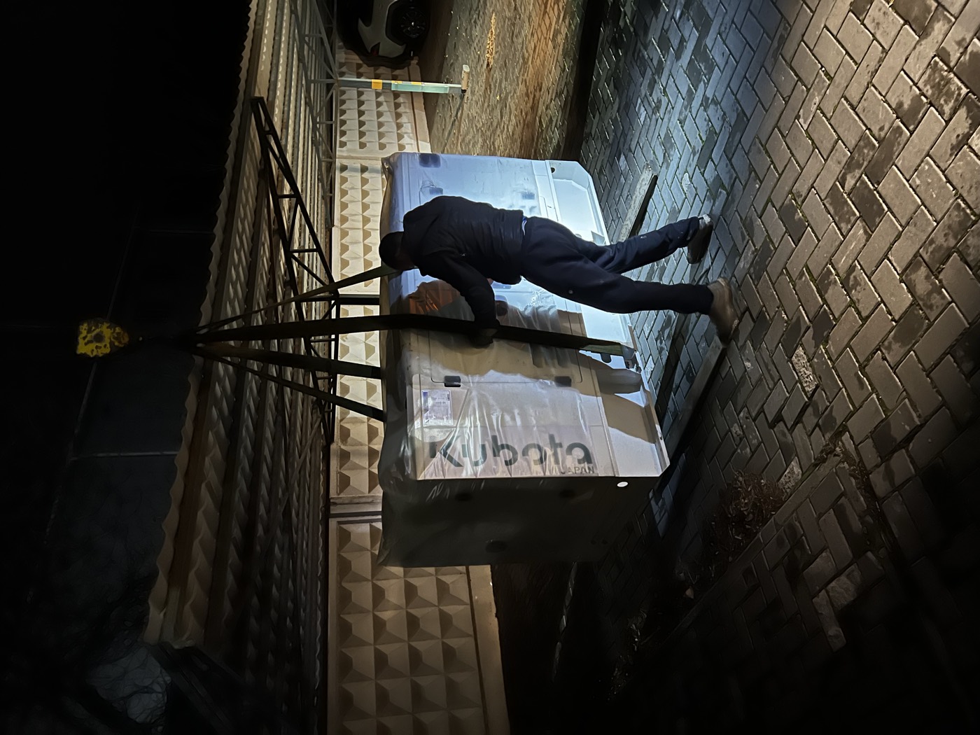 Unloading a generator set on site at night